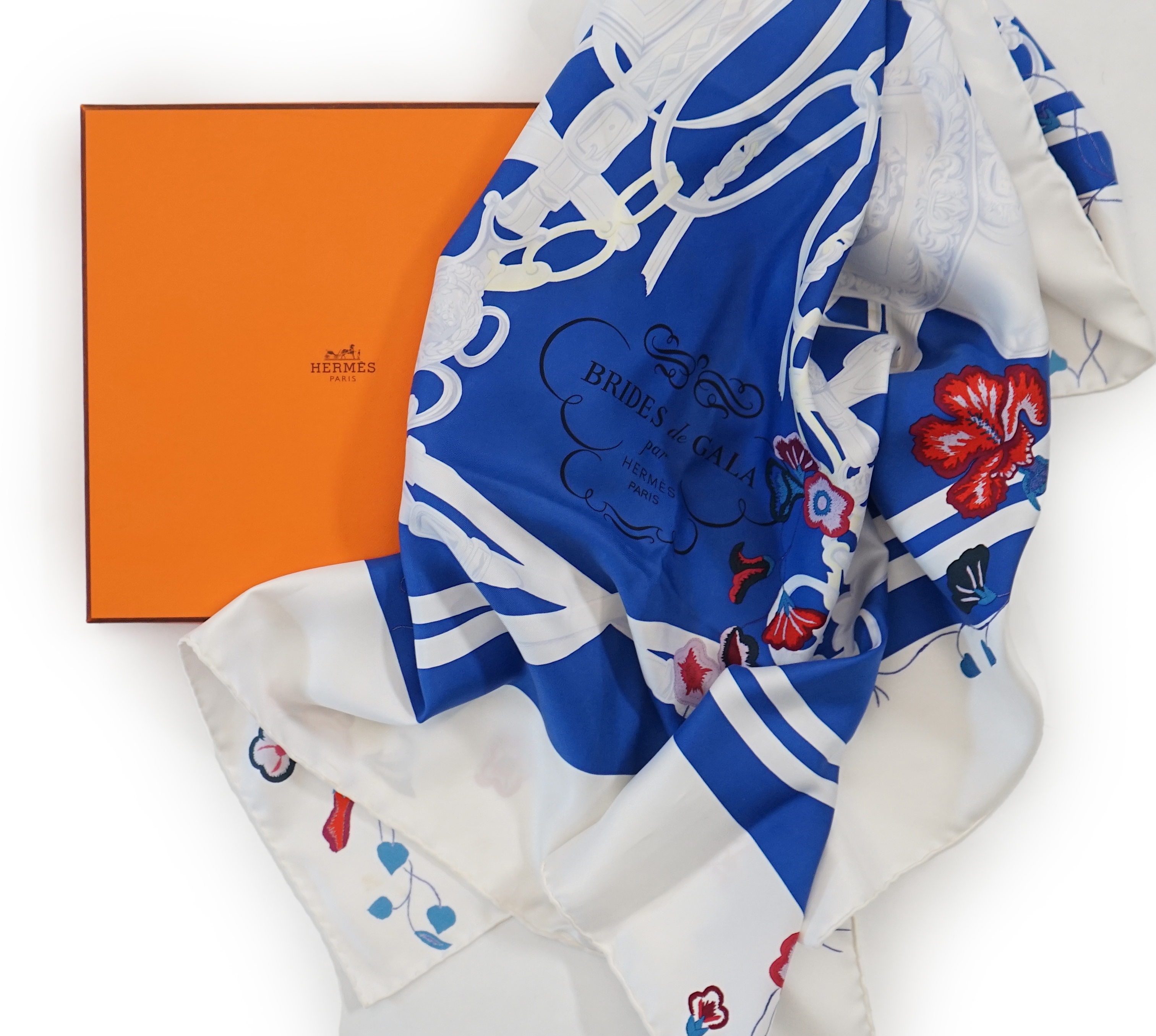 A white Hermès Brides de Gala silk scarf, approx 89cm x 88cm